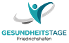 Piktogramm: Person mit freudig erhobenen Armen (mit Ellipse). Text im Logo: „GESUNDHEITSTAGE Friedrichshafen“.